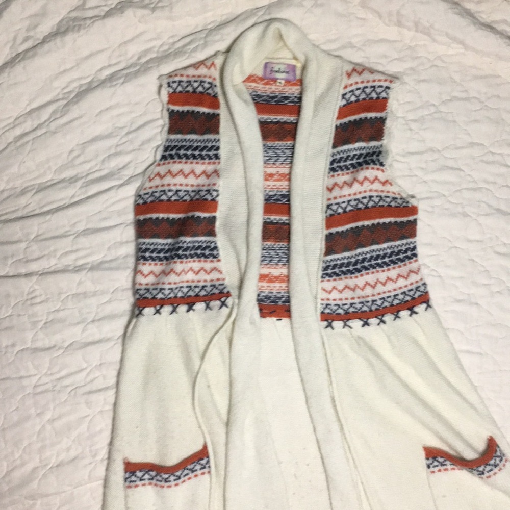 Knit cardigan vest.